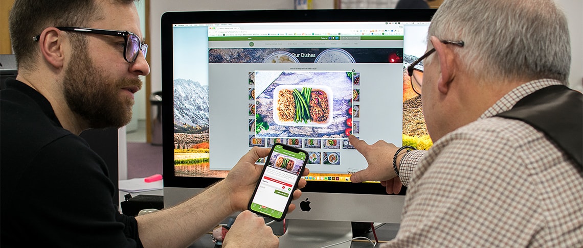 Whitespacepw ux designer and project manager testing a mobile app
